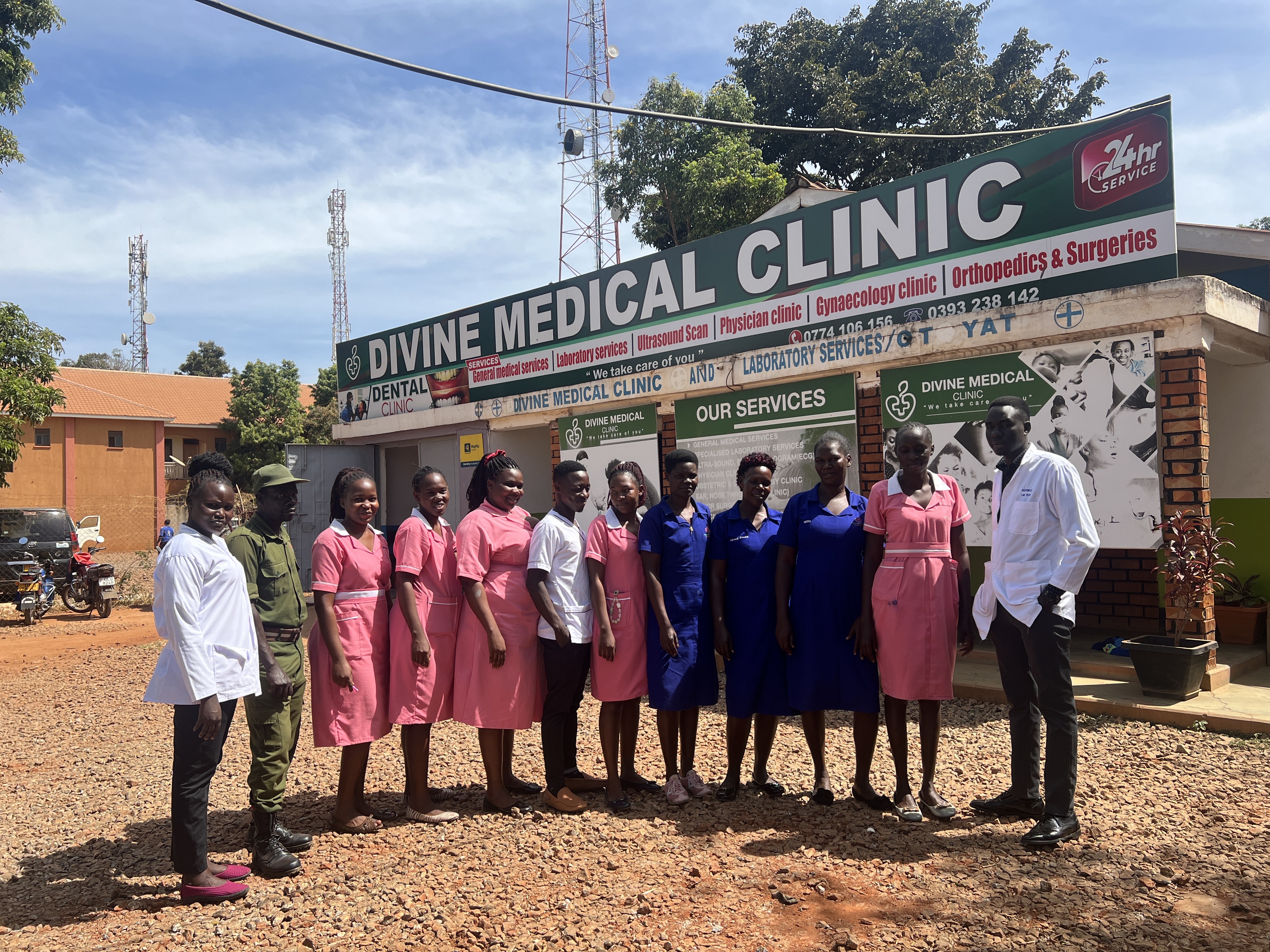 Happy patient with doctor at Divine Medical Clinic